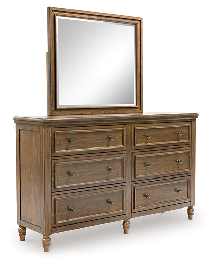Sturlayne King Upholstered Panel Bed with Mirrored Dresser and Nightstand