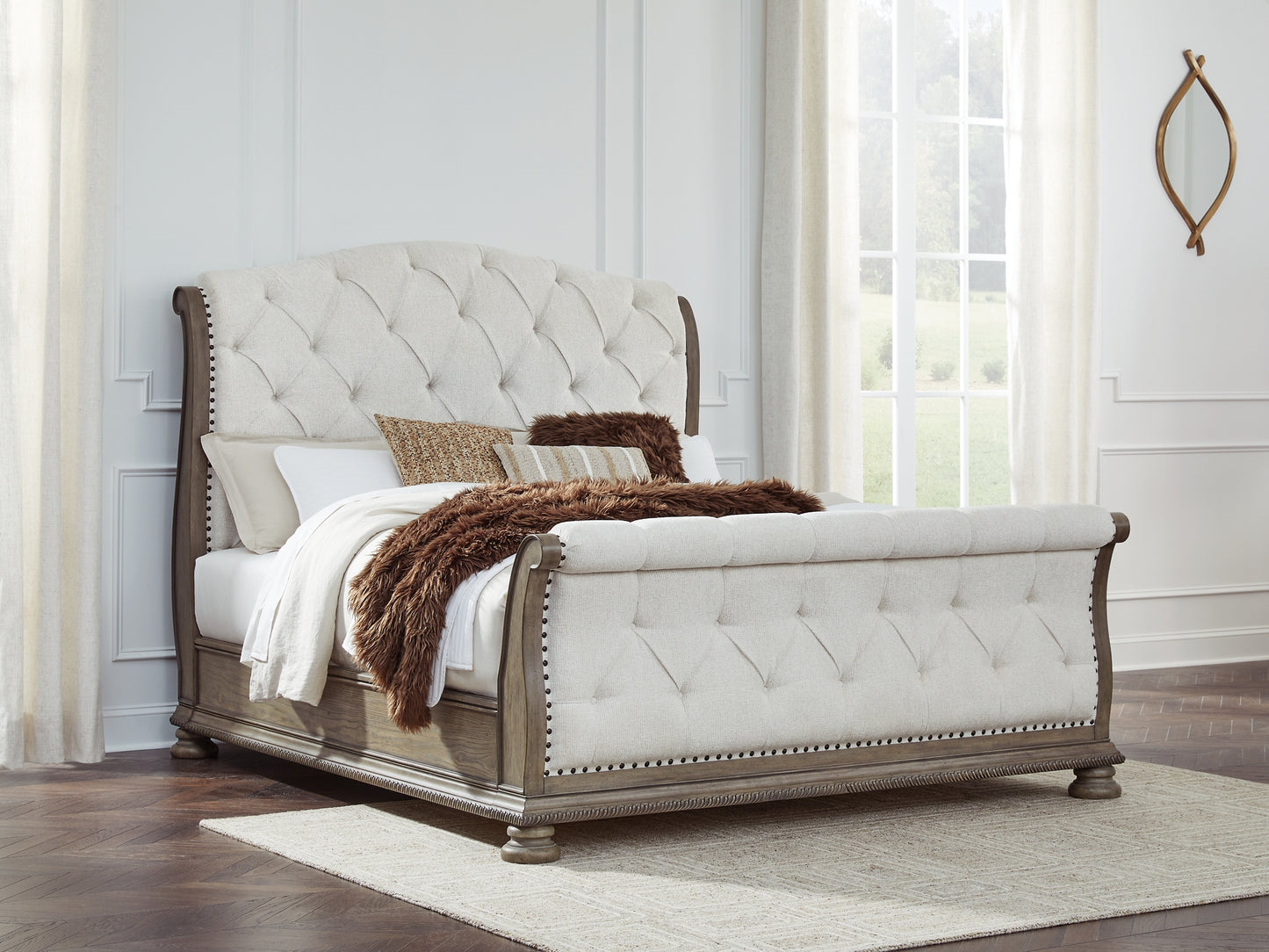 Ardenfield California King Upholstered Sleigh Bed with Mirrored Dresser and Nightstand